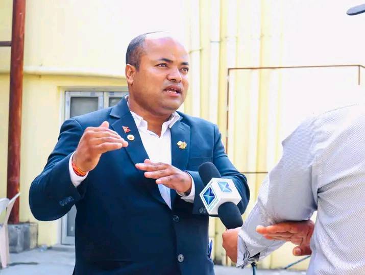 १९औं एसियाली खेलकुदमा नेपालको झण्डा बसिक्ङ प्रशिक्षक चन्द्रागिरिका दिपक महर्जनले बोक्ने