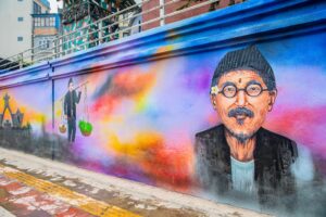 चित्ताकर्षक चित्रहरूले रंगिन थाले काठमाडाैंका भित्ता (फोटो फिचर)